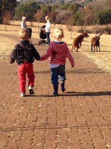 Children walking hand in hand